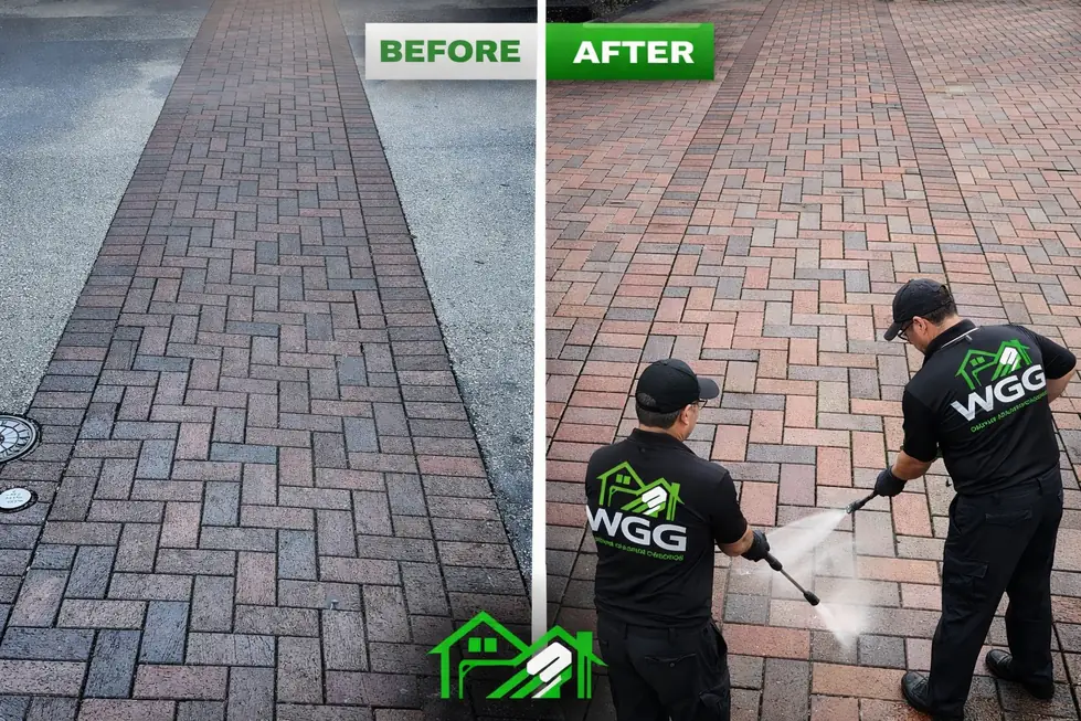 Brick pavers at a commercial plaza, grey and stained on one side, washed back to red on the other by two WGG technicians